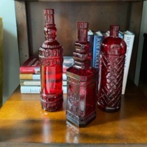 Decorative red "vintage" bottles